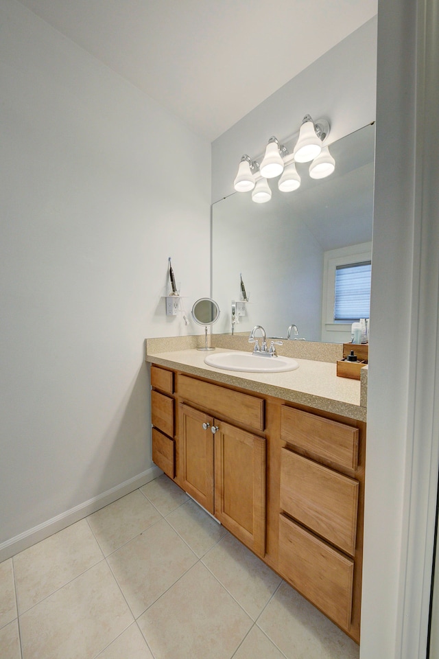 bathroom featuring tile patterned floors and vanity