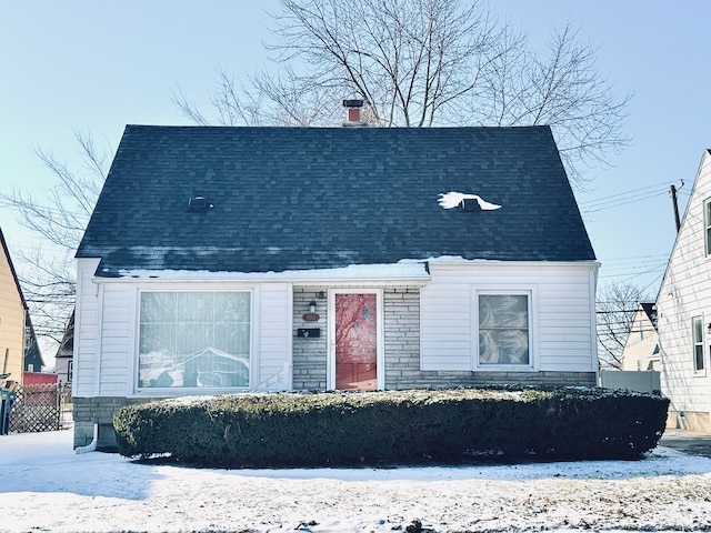 view of new england style home