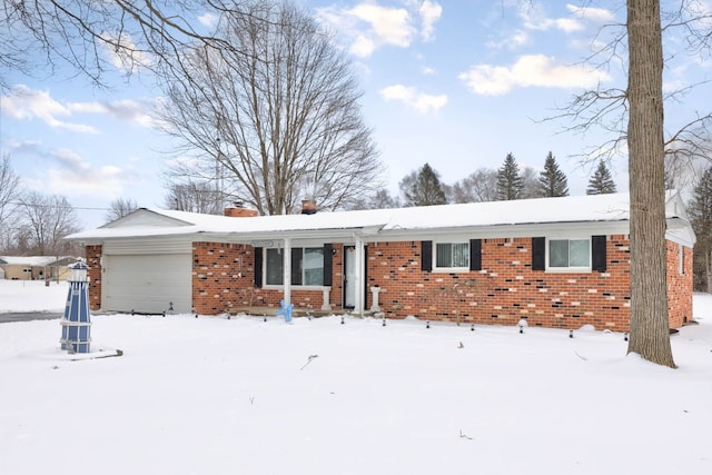 11870 Woodland Dr, Lennon, MI 48449 - ranch-style home featuring brick siding, an attached garage, and a chimney