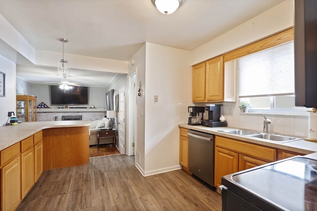 11870 Woodland Dr, Lennon, MI 48449 - kitchen with a sink, dishwasher, electric range oven, open floor plan, and backsplash