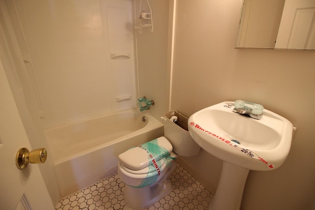 26132 Hanover St, Dearborn Heights, MI 48125 - bathroom featuring washtub / shower combination, toilet, and tile patterned flooring