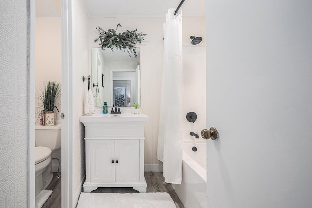 full bathroom with vanity, wood-type flooring, shower / bath combination with curtain, and toilet