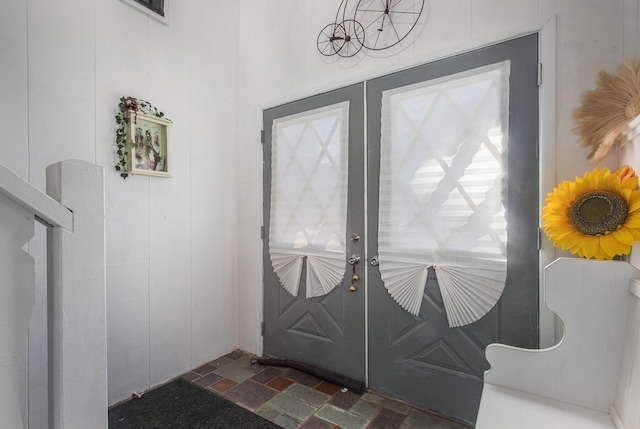 foyer entrance featuring french doors