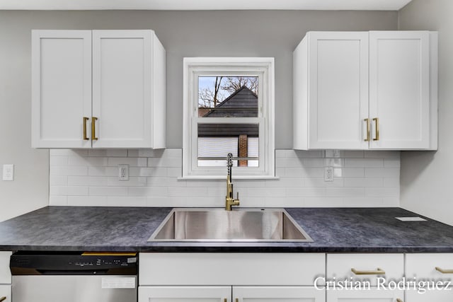 kitchen with white cabinetry, sink, and dishwasher