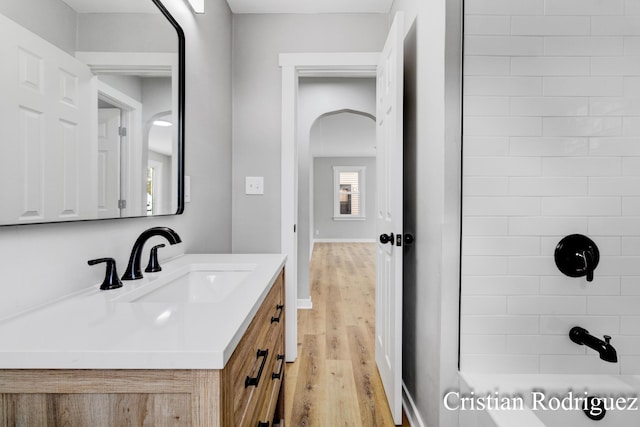 bathroom featuring hardwood / wood-style flooring and vanity