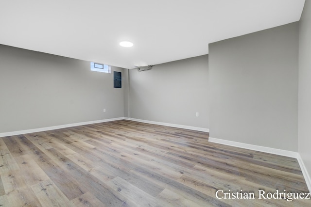 basement with wood-type flooring