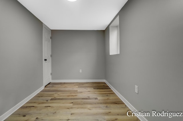 spare room featuring light wood-type flooring