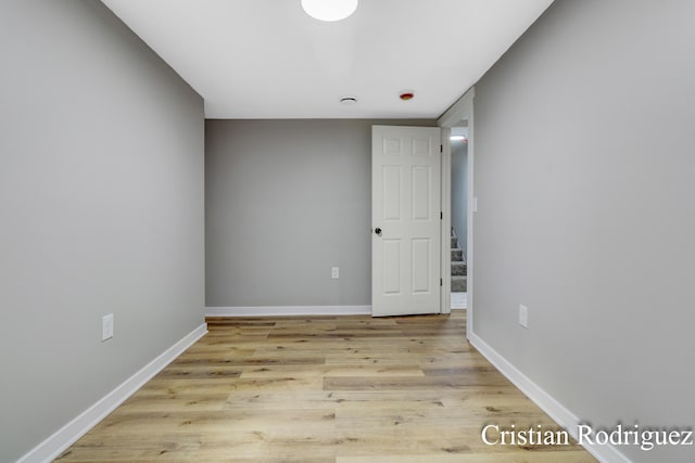 spare room with light wood-type flooring