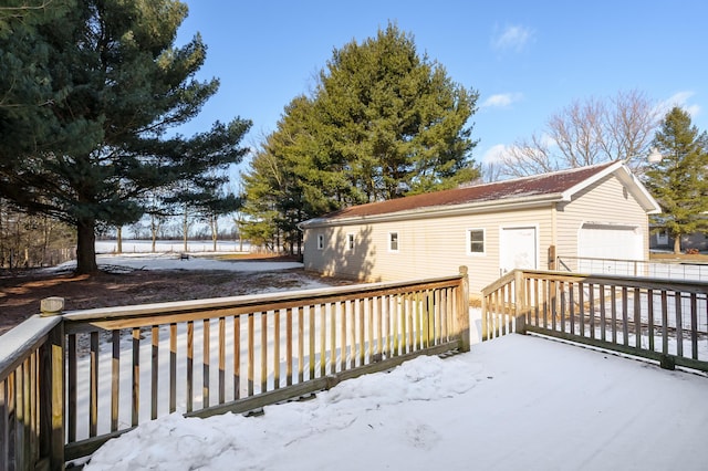 view of snow covered deck