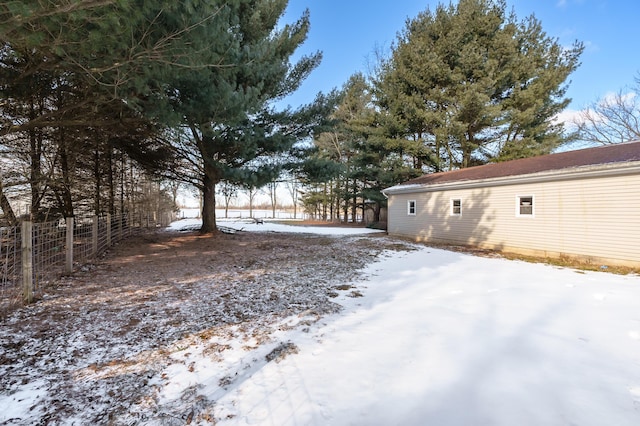 view of yard covered in snow