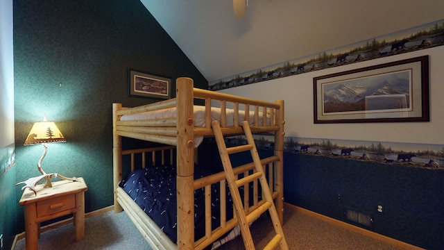 bedroom featuring carpet floors, baseboards, and vaulted ceiling