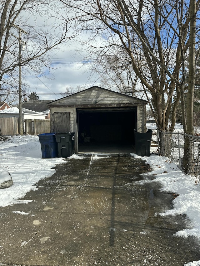 view of snow covered garage