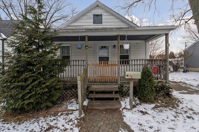 bungalow-style home with a porch