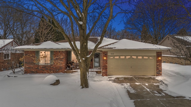 single story home featuring a garage