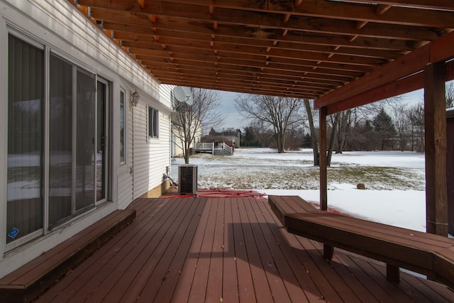 view of snow covered deck