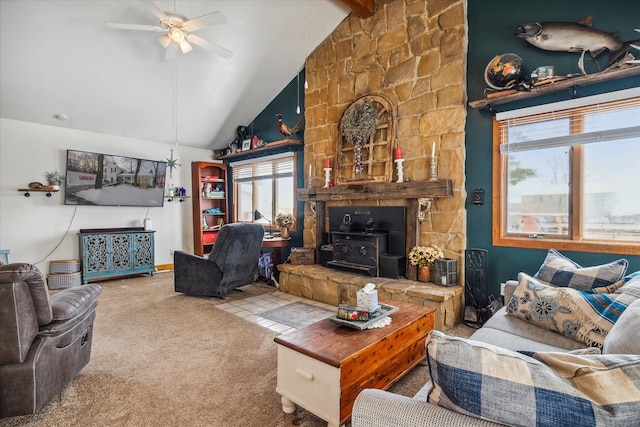 living room with ceiling fan, beam ceiling, high vaulted ceiling, carpet, and a wood stove