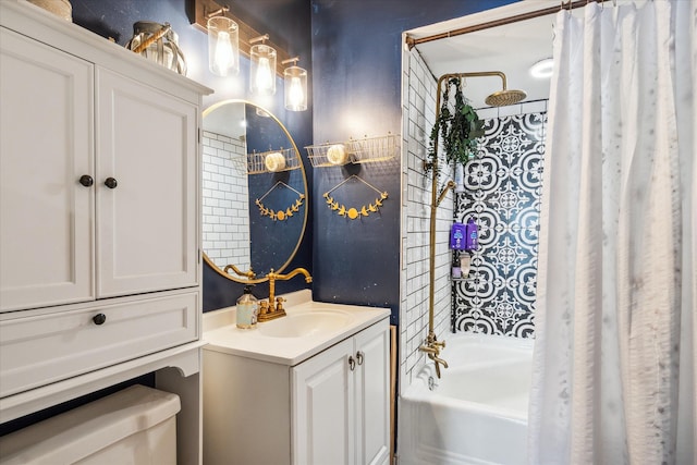 full bathroom with vanity, shower / tub combo, and toilet