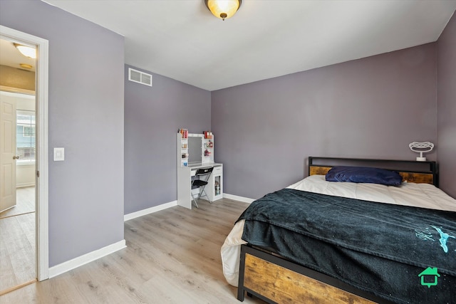 bedroom featuring light wood-type flooring