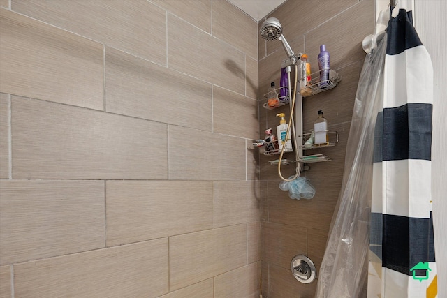 bathroom with a shower with curtain