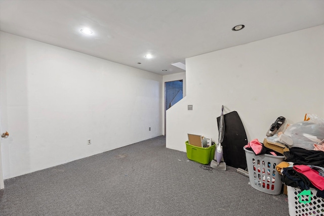 basement featuring carpet flooring