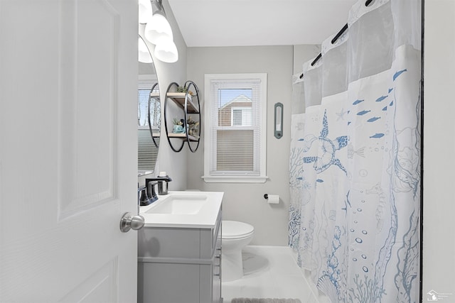 bathroom with vanity, a shower with curtain, and toilet