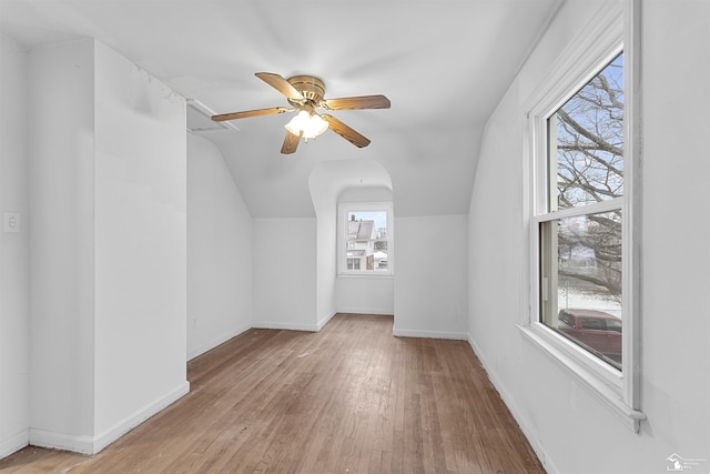 bonus room featuring lofted ceiling, ceiling fan, and light hardwood / wood-style flooring