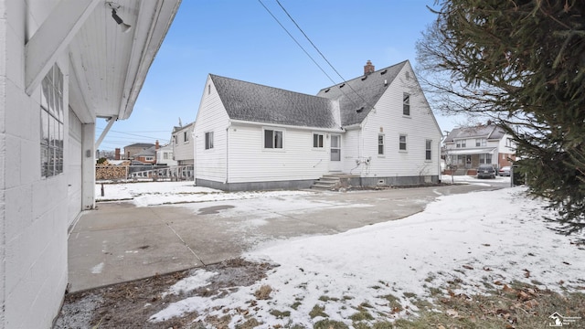 view of snow covered property