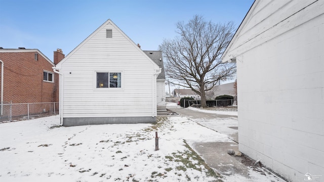 view of snow covered property