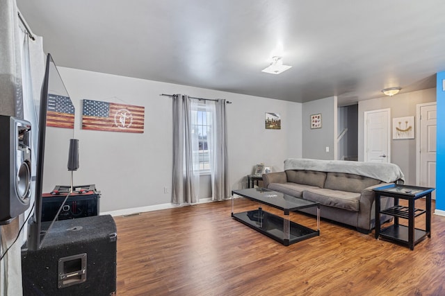 living room with hardwood / wood-style flooring