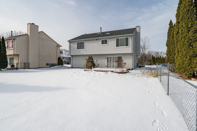 view of snow covered house