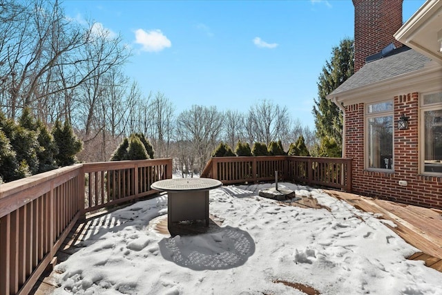 view of snow covered deck