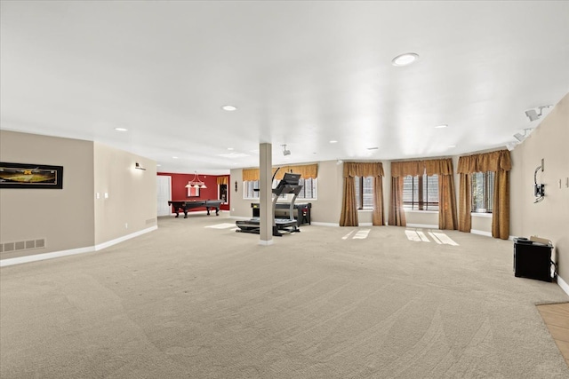 exercise room with billiards and light colored carpet