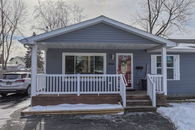 view of front of property featuring covered porch