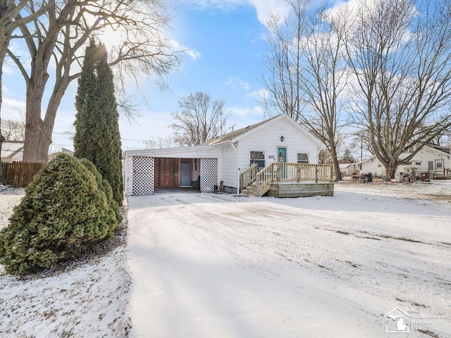 view of front of house with a carport