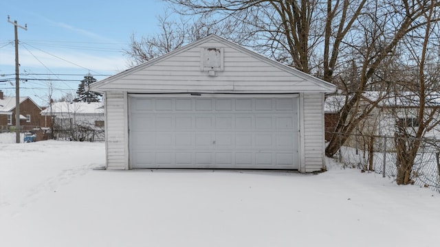 view of snow covered garage