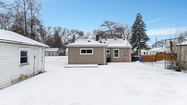 view of snow covered property