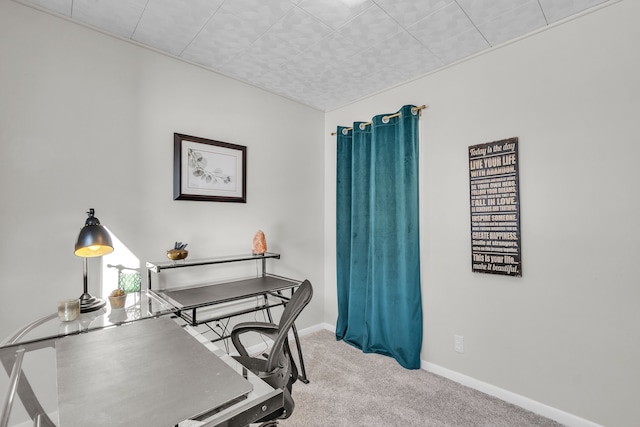 office space with light colored carpet