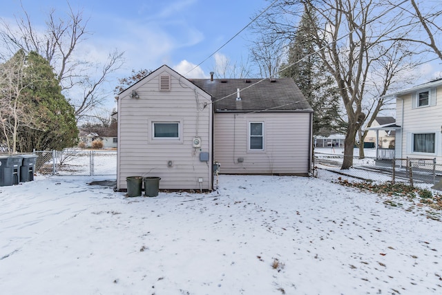 view of snow covered property