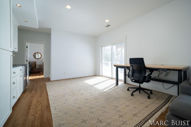 office space featuring light hardwood / wood-style floors