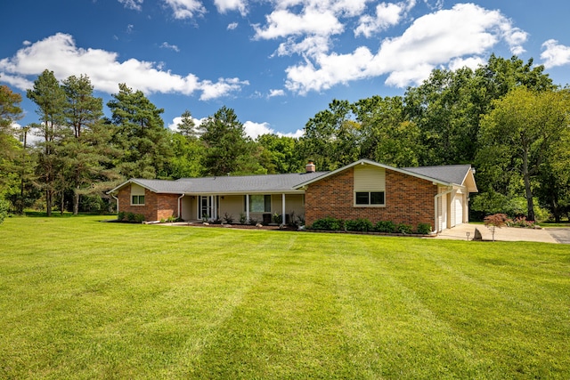 7500 Dexter Pinckney Rd, Dexter, MI 48130 - single story home featuring a garage and a front lawn