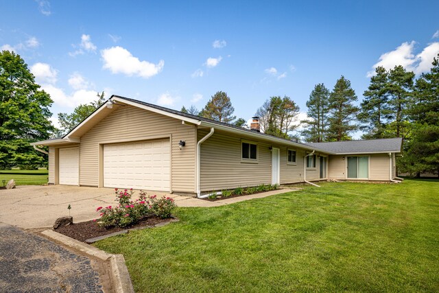 7500 Dexter Pinckney Rd, Dexter, MI 48130 - ranch-style home with a garage and a front lawn