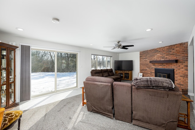 7500 Dexter Pinckney Rd, Dexter, MI 48130 - carpeted living room featuring a brick fireplace and ceiling fan