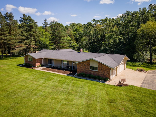 7500 Dexter Pinckney Rd, Dexter, MI 48130 - ranch-style home featuring a garage and a front yard