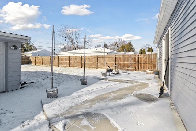 view of snow covered patio