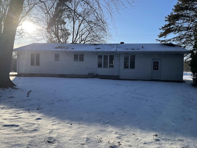 view of snow covered property