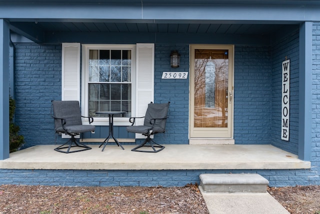 property entrance with a porch