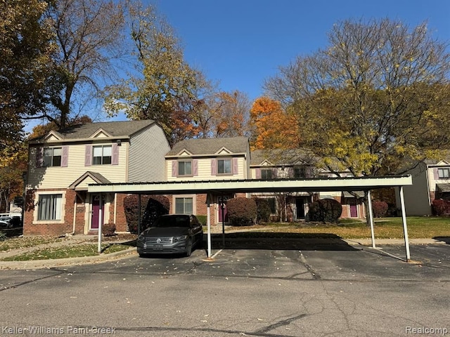 view of property featuring a carport