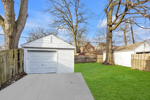 garage with a lawn