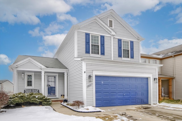 front of property with a garage