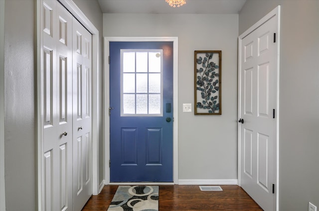 doorway featuring dark hardwood / wood-style flooring